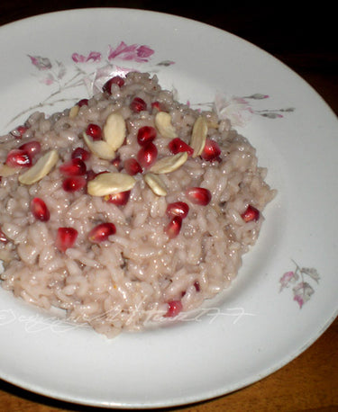 foto ricetta Riso con melagrana, caprino e mandorle in scaglie 