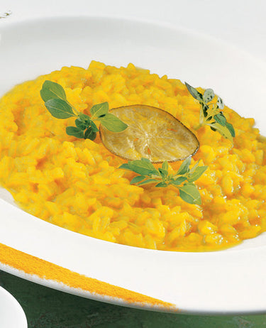 foto ricetta Risotto al limone e curcuma con costolette d'agnello - Riso Gallo 