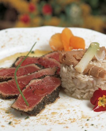 foto ricetta Risotto con porri e calamaretti su tagliata di tonno al profumo di bottarga 