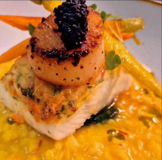 SAFFRON RISOTTO, ROASTED SCALLOP, BABY CARROTS, WILTED BABY SPINACH, CAVIAR & BROCCO CRESS 