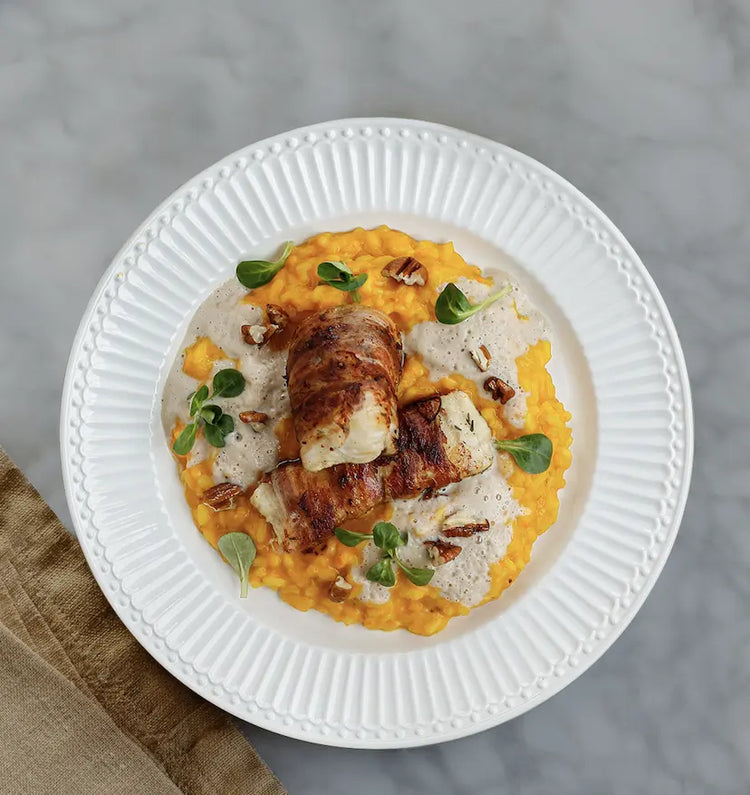 Risotto alla zucca con filetto di pesce gatto arrostito, bacon e spuma di castagne 
